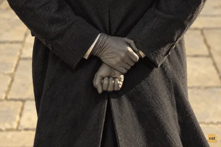 Hearing the name Hyde, Mr. Utterson walks on in silence, gloved hands clenched behind him